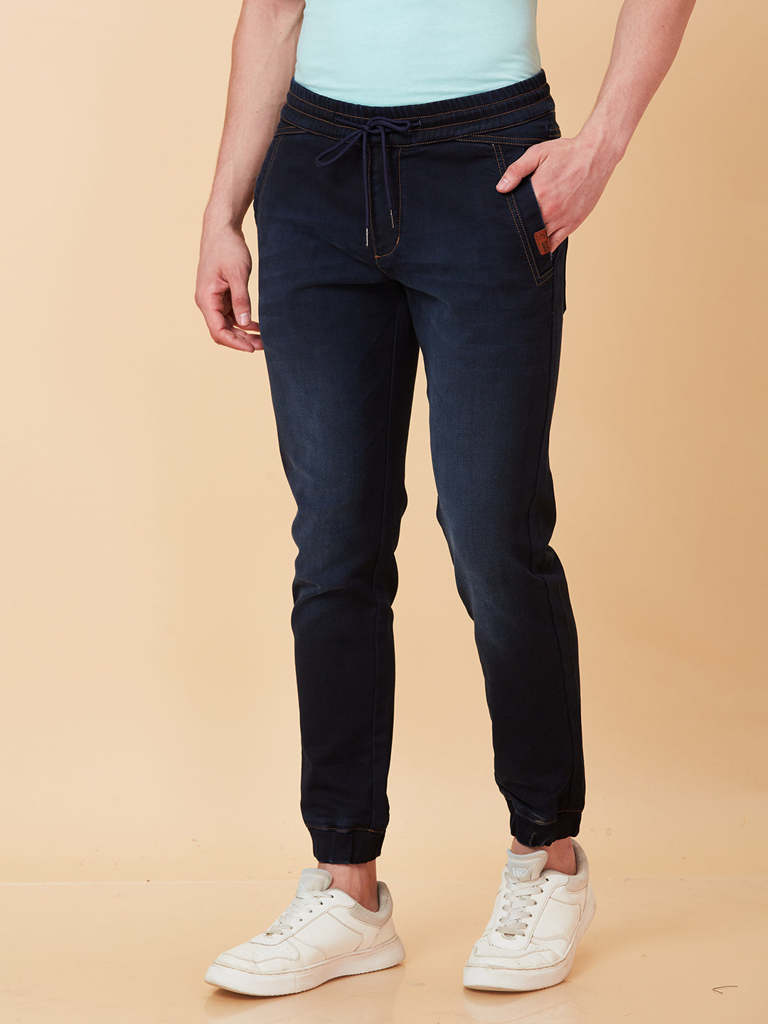 Dark Blue Jogger Fit Denims For Men By Being Human Clothing