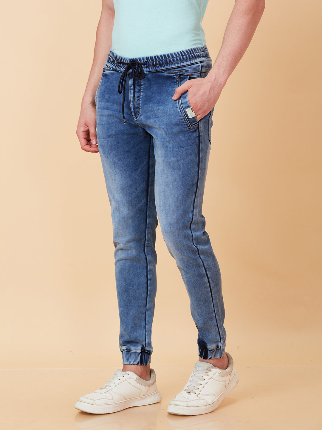 Light Blue Jogger Fit Denims For Men By Being Human Clothing