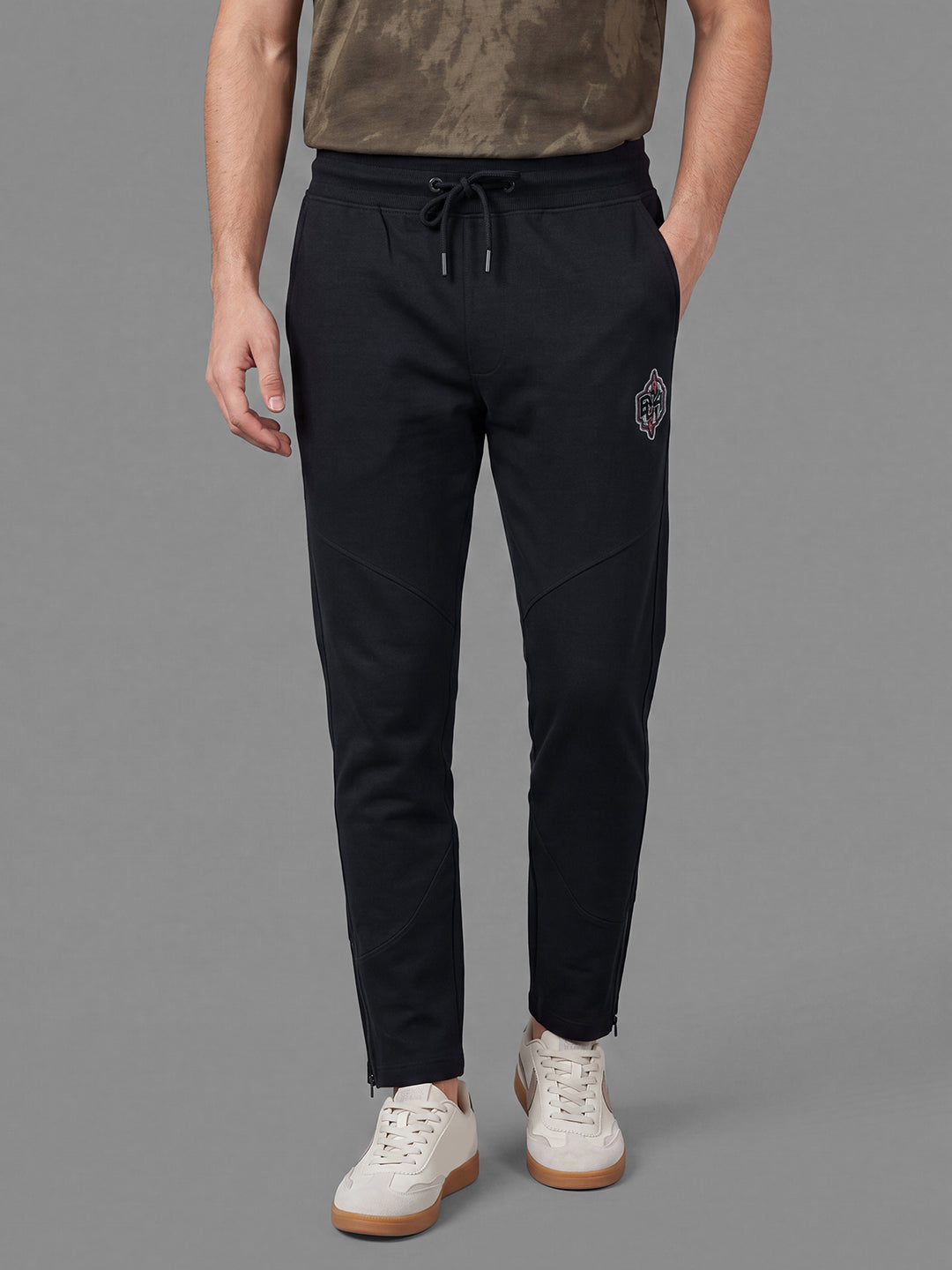 Black Loose Regular Fit Solid Cotton Blend Mid Rise Men's Track Pants by Being Human Clothing