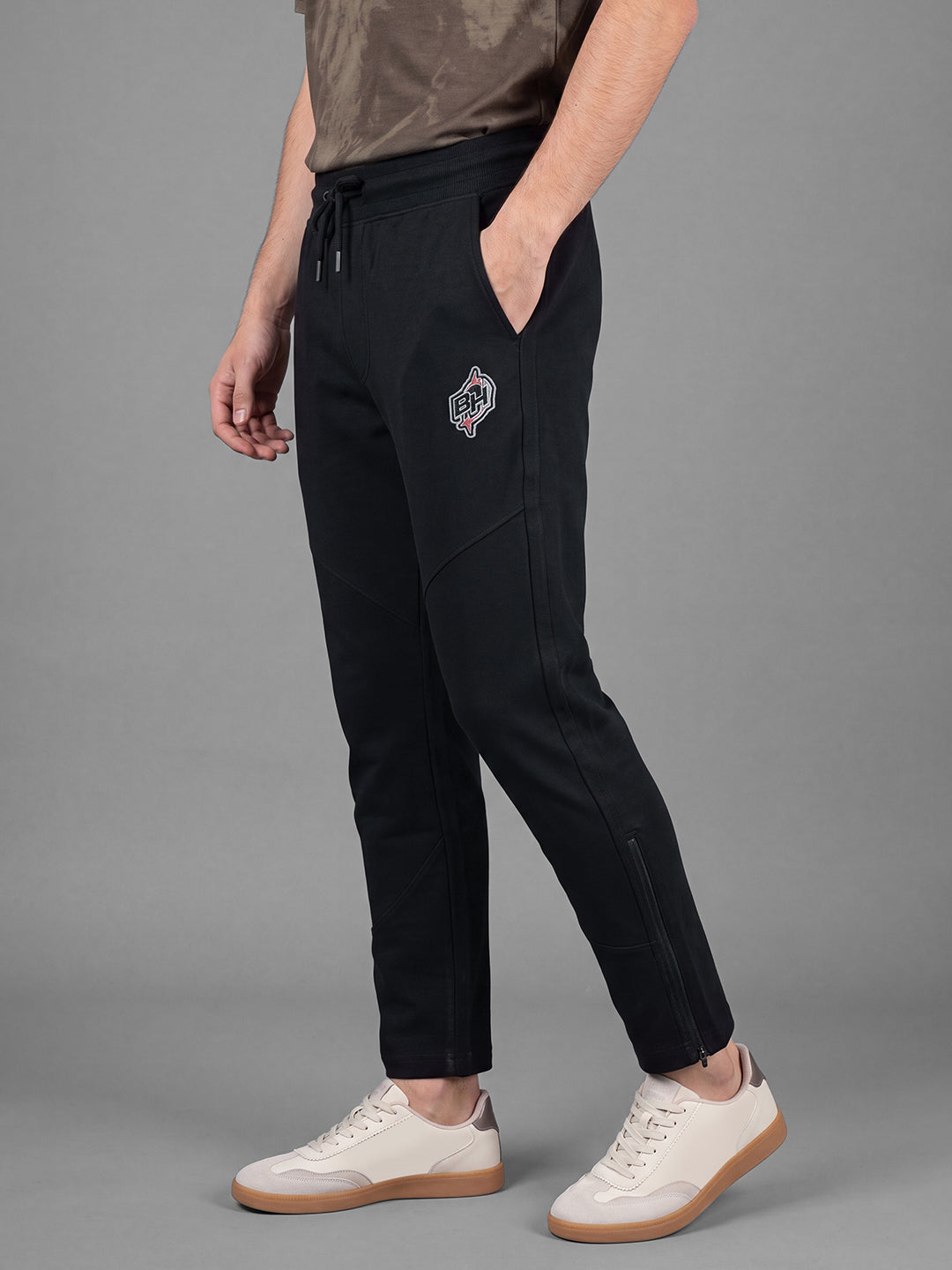 Black Loose Regular Fit Solid Cotton Blend Mid Rise Men's Track Pants by Being Human Clothing