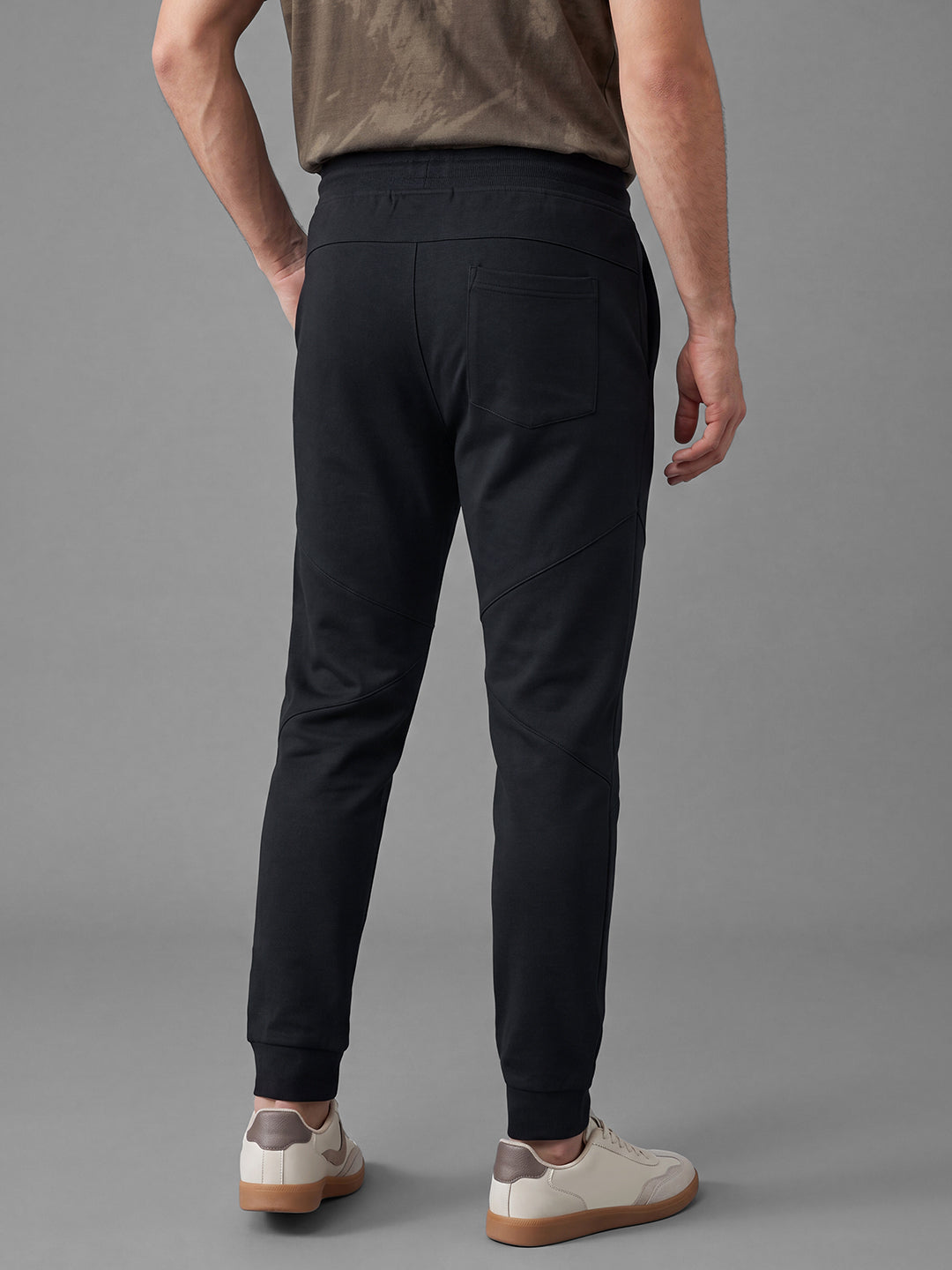 Black Loose Regular Fit Solid Cotton Blend Mid Rise Men's Track Pants by Being Human Clothing