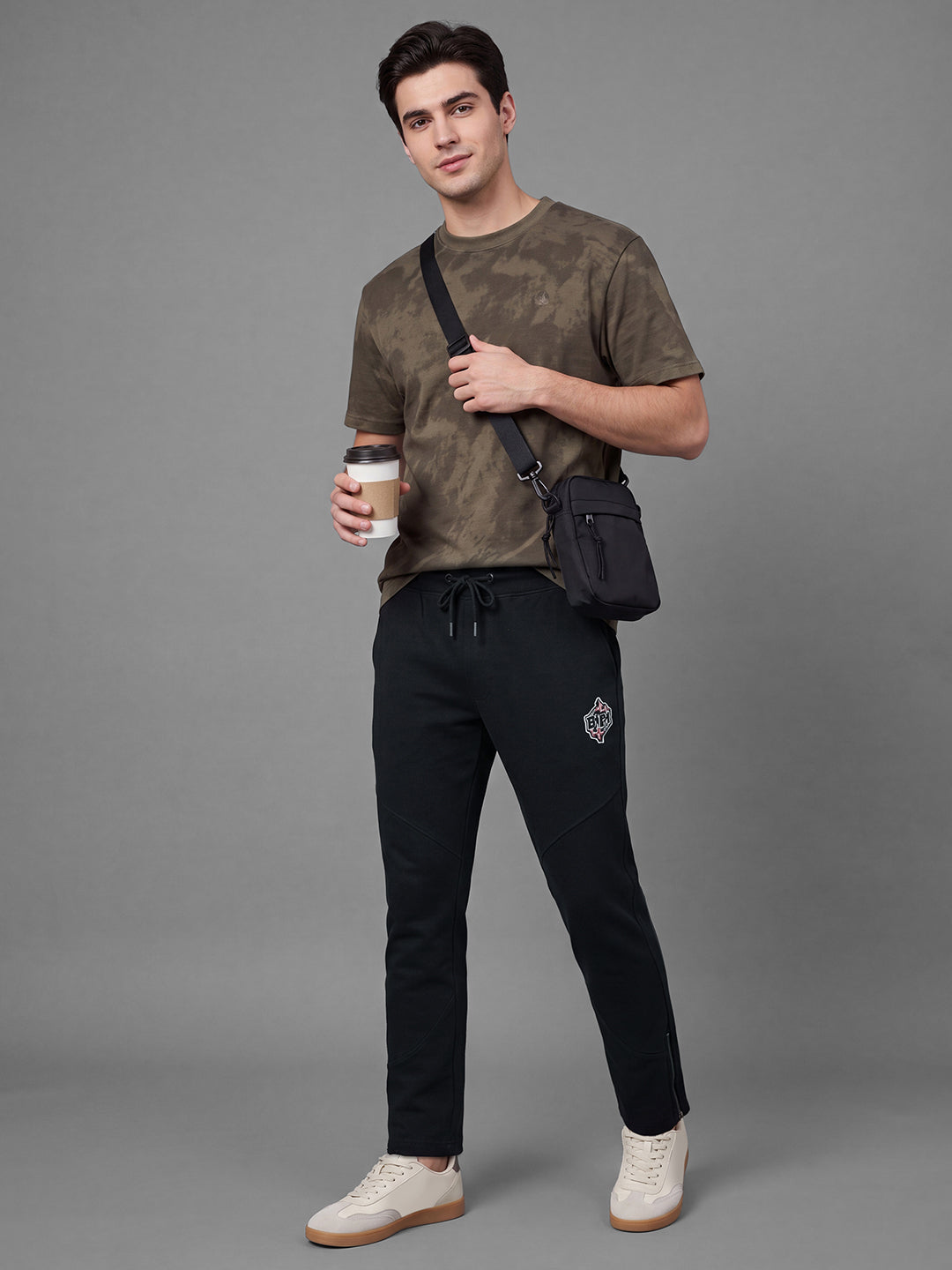 Black Loose Regular Fit Solid Cotton Blend Mid Rise Men's Track Pants by Being Human Clothing