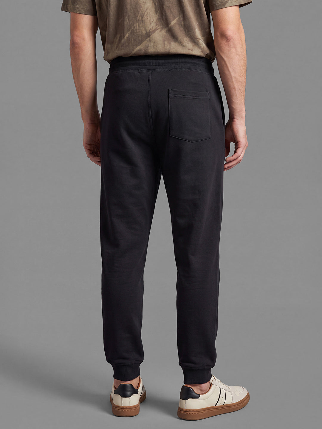 Black Loose Regular Fit Graphic Print Pure Cotton Mid Rise Men's Track Pants by Being Human Clothing