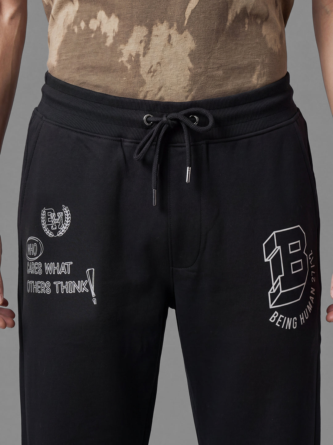 Black Loose Regular Fit Graphic Print Pure Cotton Mid Rise Men's Track Pants by Being Human Clothing