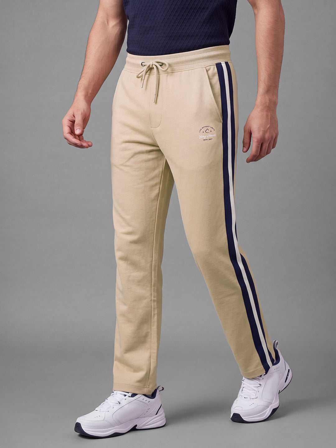 Beige Loose Regular Fit Colorblock Cotton Blend Mid Rise Men's Track Pants by Being Human Clothing