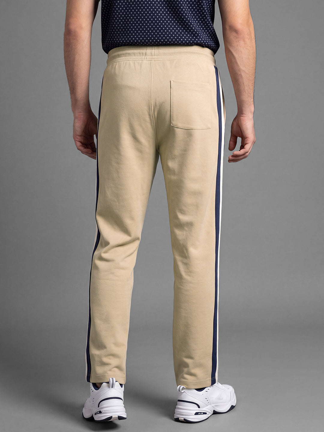Beige Loose Regular Fit Colorblock Cotton Blend Mid Rise Men's Track Pants by Being Human Clothing