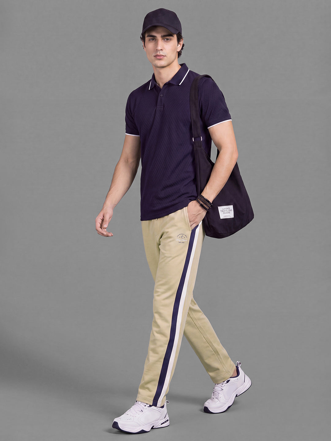 Beige Loose Regular Fit Colorblock Cotton Blend Mid Rise Men's Track Pants by Being Human Clothing