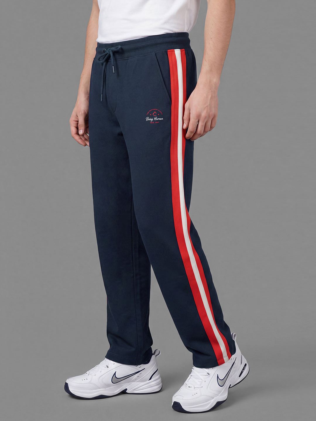 Blue Loose Regular Fit Colorblock Cotton Blend Mid Rise Men's Track Pants by Being Human Clothing