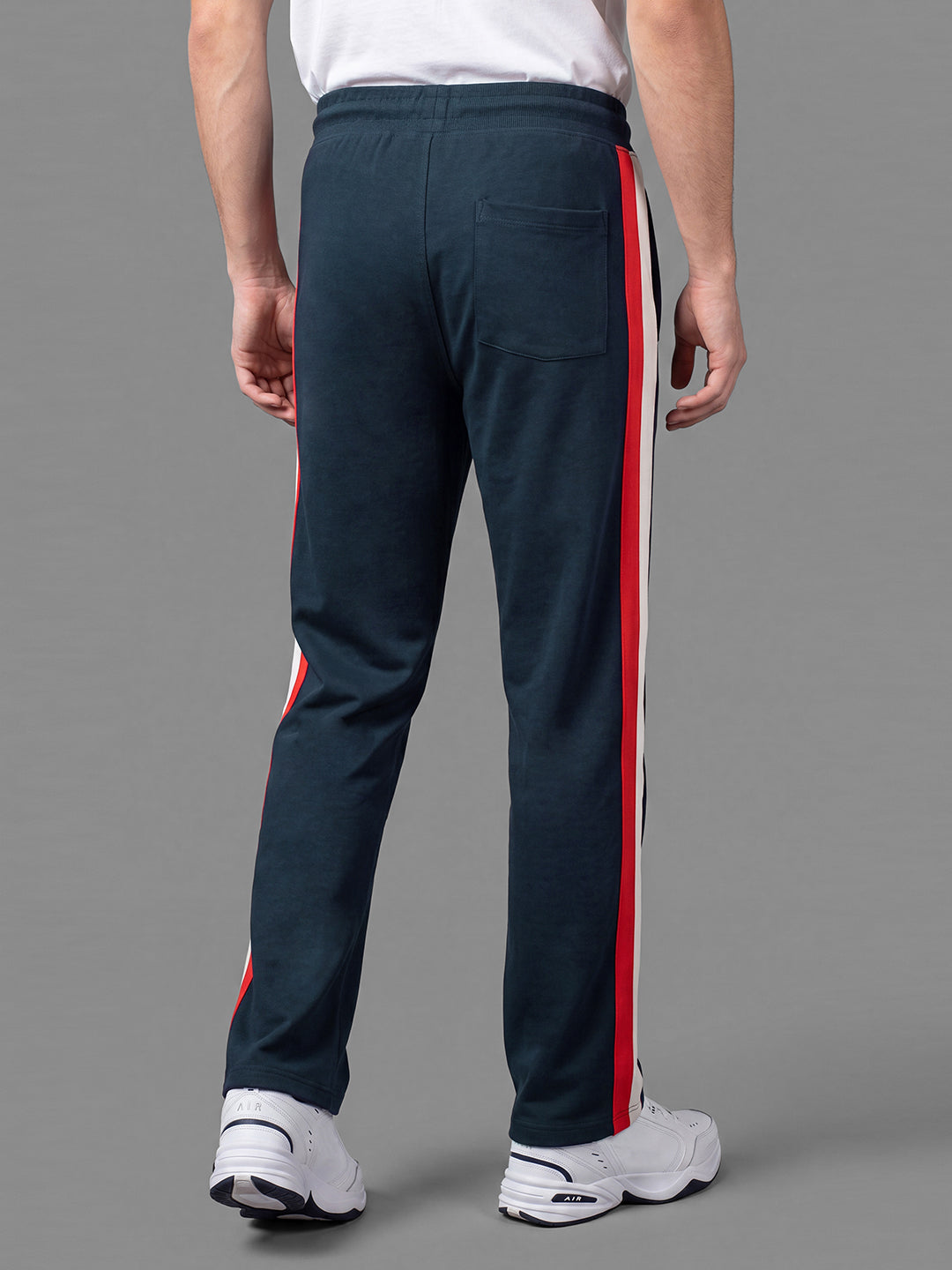 Blue Loose Regular Fit Colorblock Cotton Blend Mid Rise Men's Track Pants by Being Human Clothing