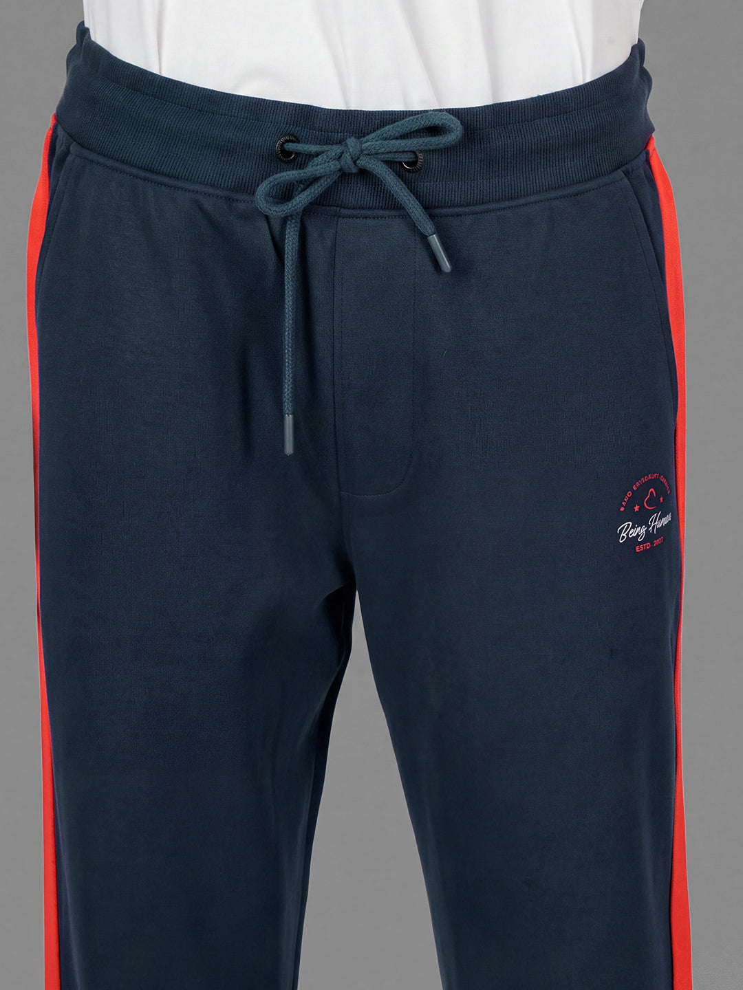 Blue Loose Regular Fit Colorblock Cotton Blend Mid Rise Men's Track Pants by Being Human Clothing