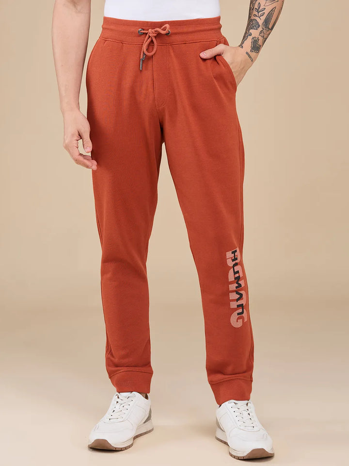 Orange Regular Fit Men's Track Pants by Being Human Clothing