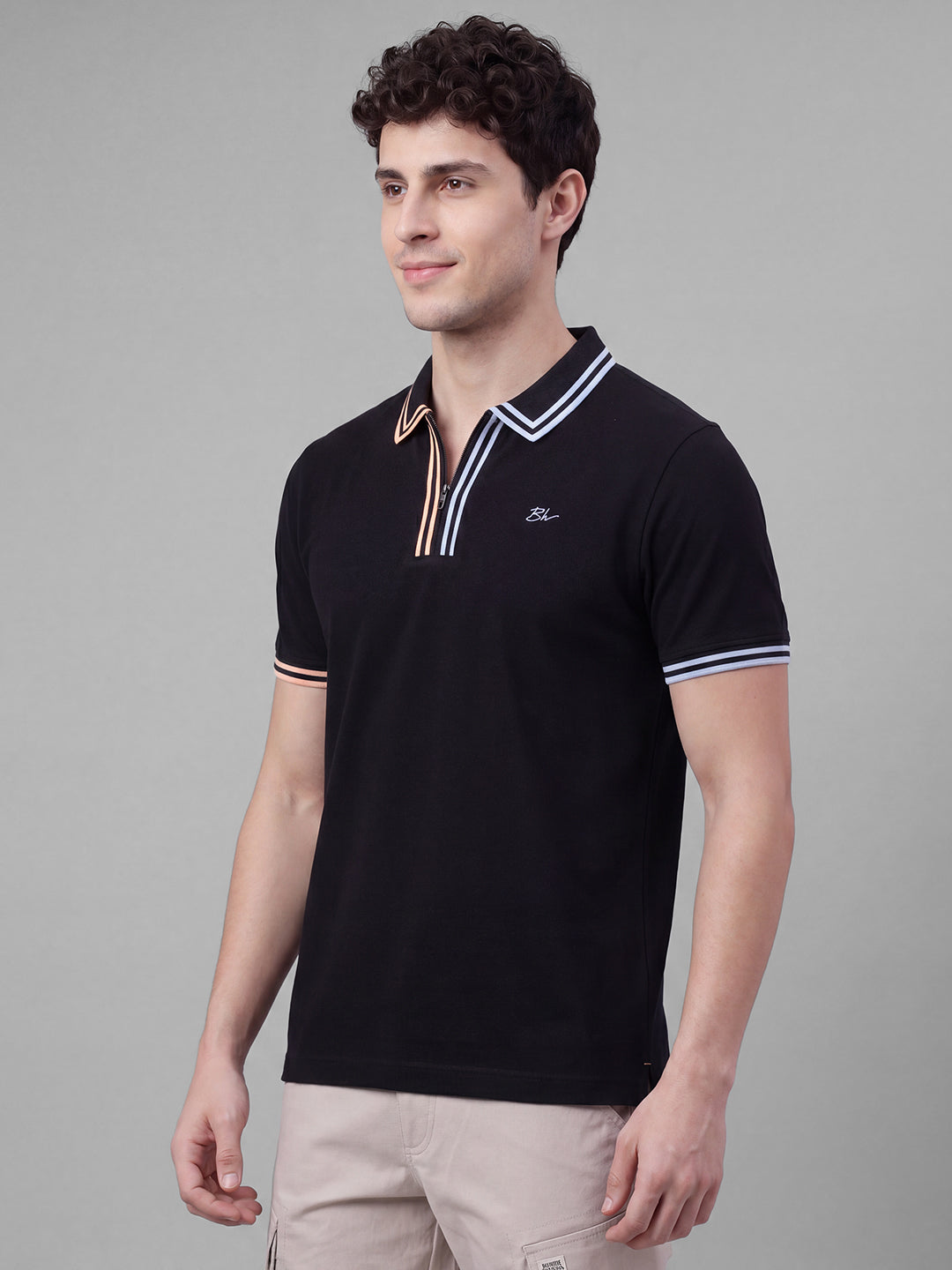 Black Moderno Fit Solid Pure Cotton Short Sleeves Polo Collar Men's T-shirt by Being Human Clothing