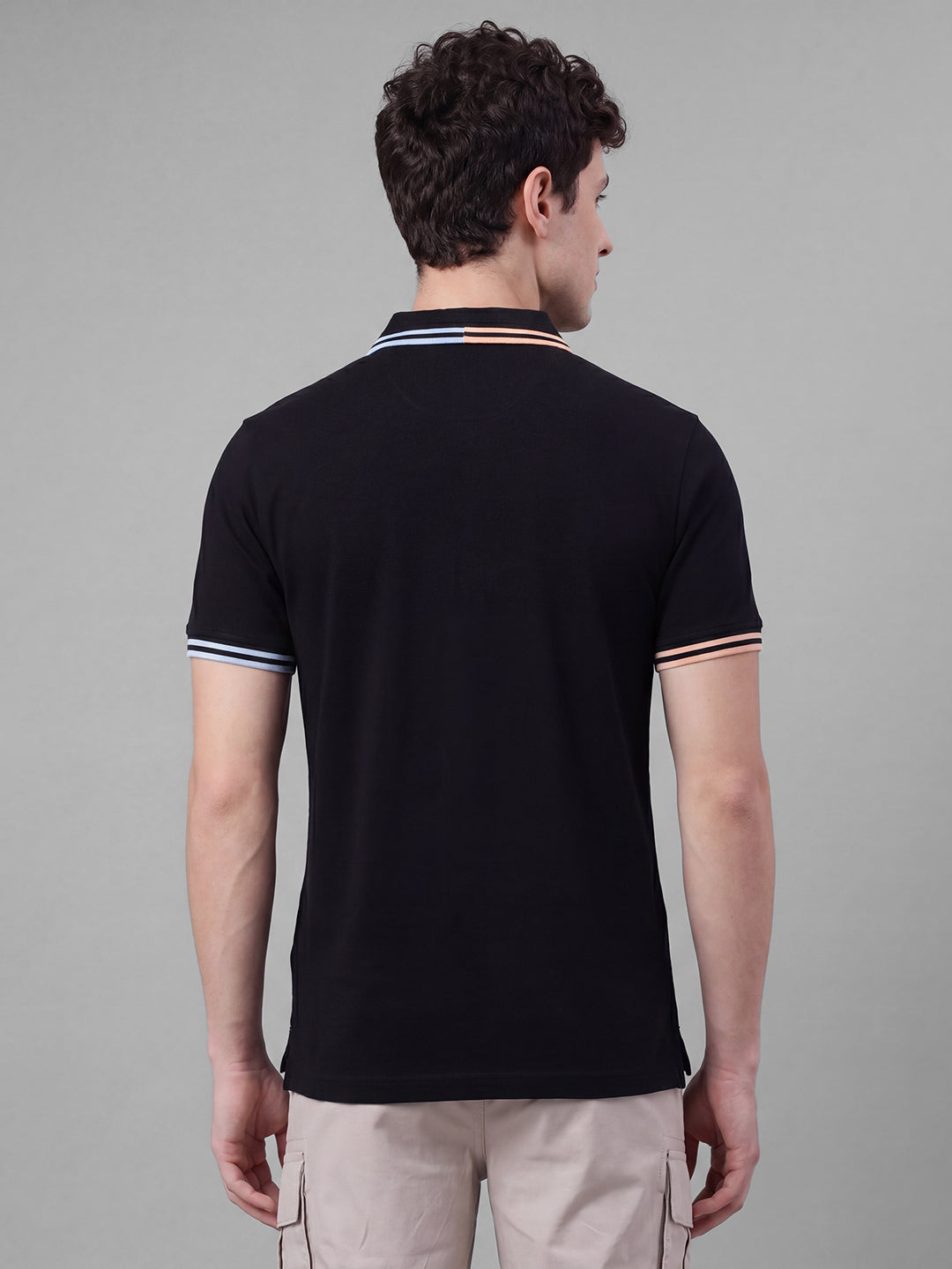 Black Moderno Fit Solid Pure Cotton Short Sleeves Polo Collar Men's T-shirt by Being Human Clothing