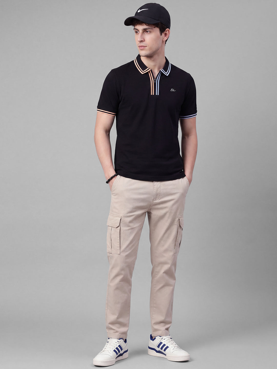 Black Moderno Fit Solid Pure Cotton Short Sleeves Polo Collar Men's T-shirt by Being Human Clothing