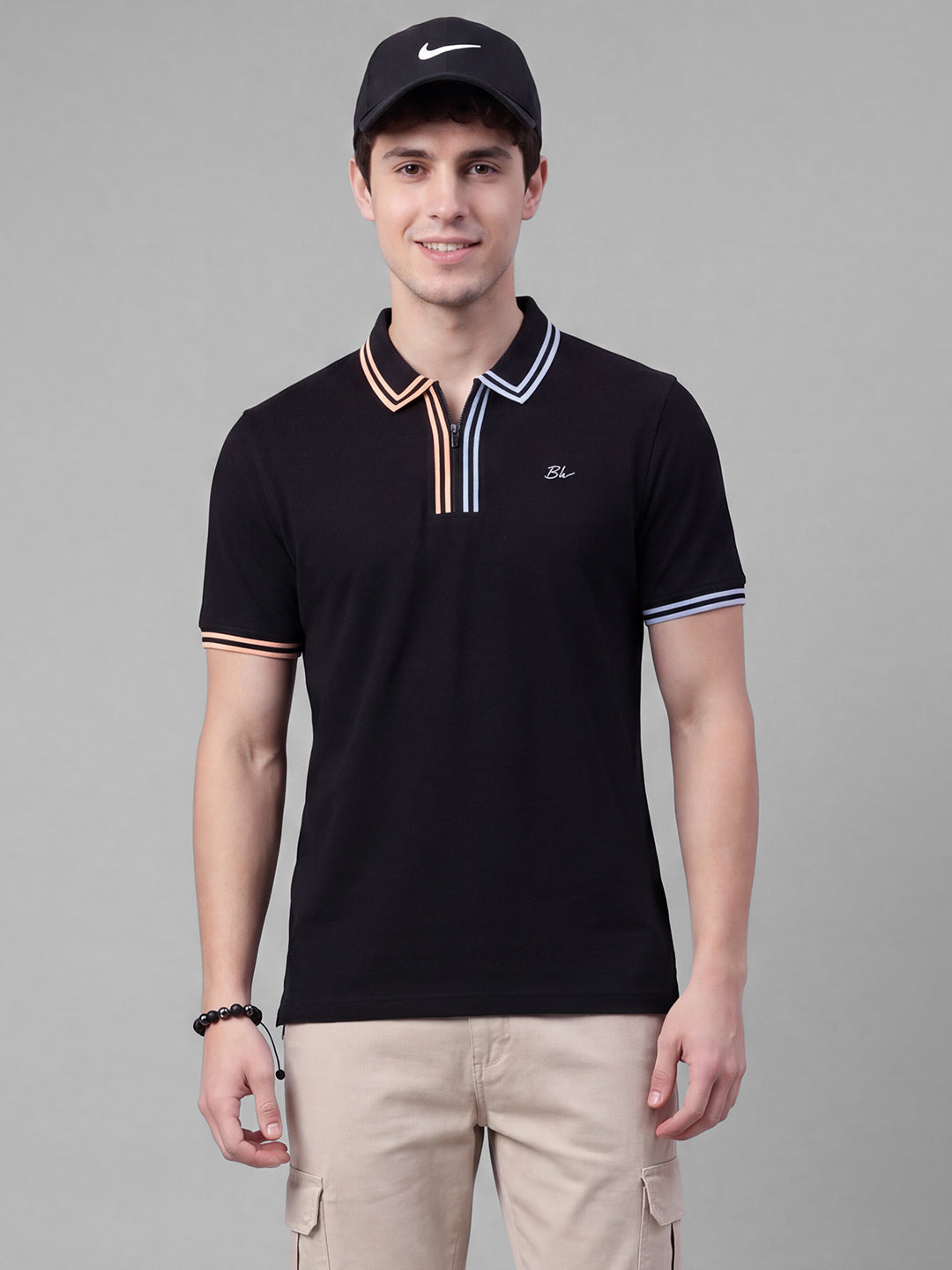 Black Moderno Fit Solid Pure Cotton Short Sleeves Polo Collar Men's T-shirt by Being Human Clothing