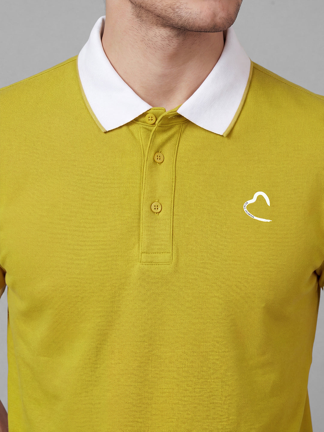 Mustard Moderno Fit Solid Pure Cotton Short Sleeves Polo Collar Men's T-shirt by Being Human Clothing