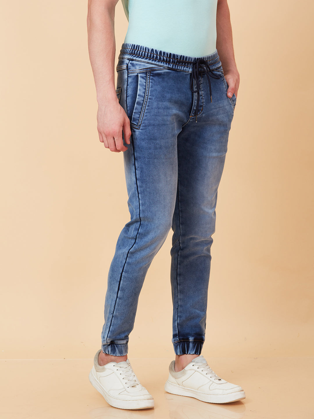 Light Blue Jogger Fit Denims For Men By Being Human Clothing